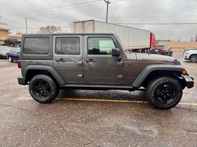 used 2016 Jeep Wrangler Unlimited car, priced at $16,990