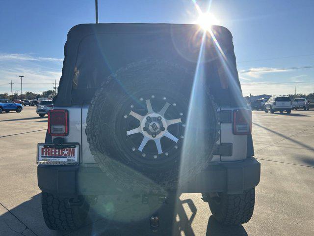 used 2015 Jeep Wrangler Unlimited car, priced at $16,885