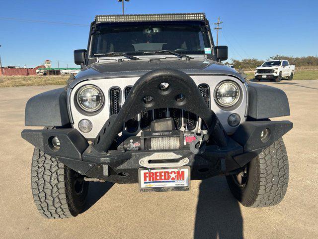 used 2015 Jeep Wrangler Unlimited car, priced at $16,885