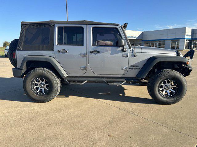 used 2015 Jeep Wrangler Unlimited car, priced at $16,885