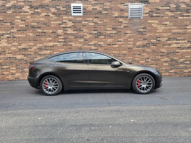 used 2018 Tesla Model 3 car, priced at $14,999