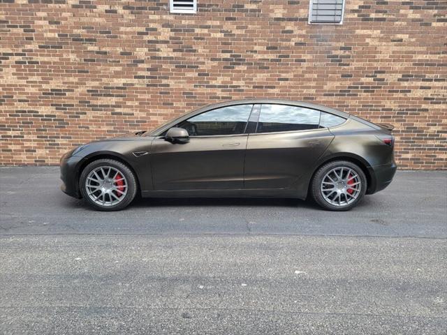used 2018 Tesla Model 3 car, priced at $14,999