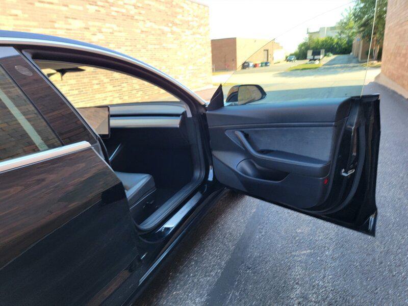 used 2020 Tesla Model 3 car, priced at $13,999