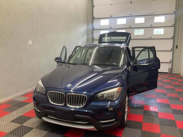 used 2014 BMW X1 car, priced at $10,995