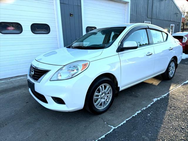 used 2012 Nissan Versa car, priced at $5,750