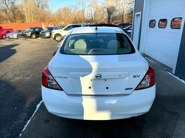 used 2012 Nissan Versa car, priced at $5,750