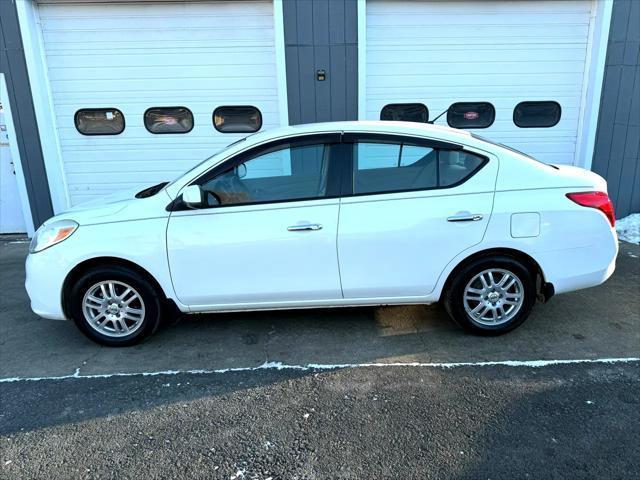 used 2012 Nissan Versa car, priced at $5,750