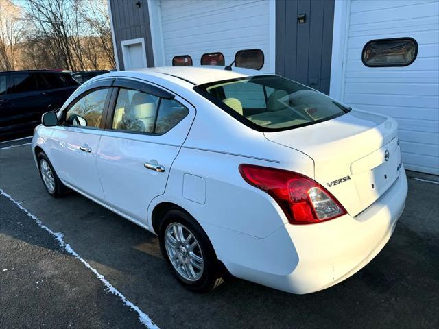 used 2012 Nissan Versa car, priced at $5,750