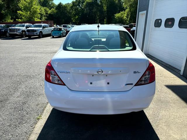 used 2012 Nissan Versa car, priced at $6,950