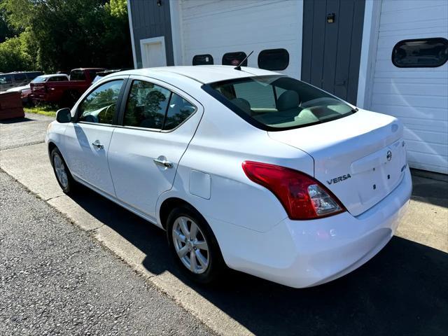 used 2012 Nissan Versa car, priced at $6,950
