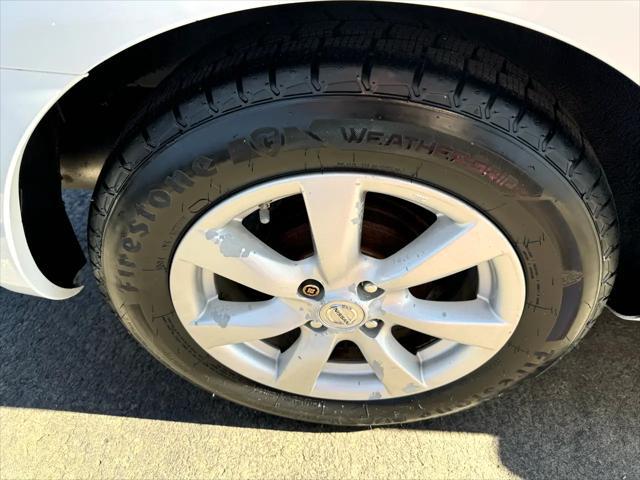 used 2012 Nissan Versa car, priced at $6,950