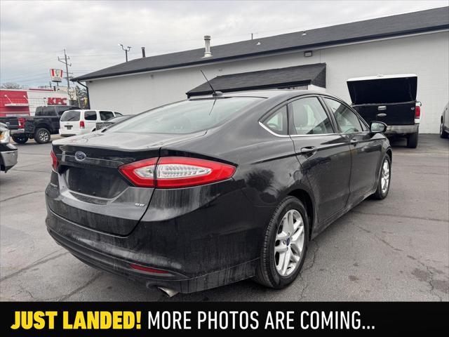 used 2014 Ford Fusion car, priced at $7,990