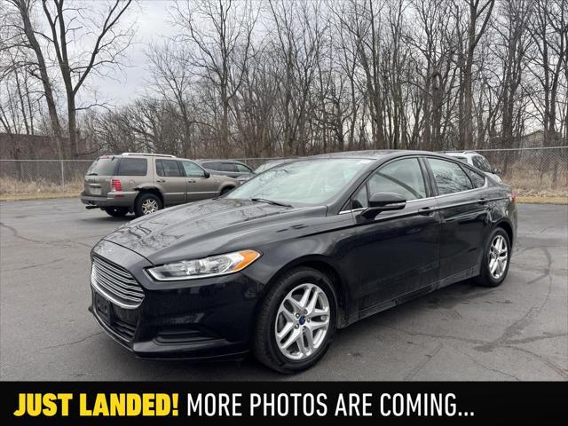 used 2014 Ford Fusion car, priced at $7,990