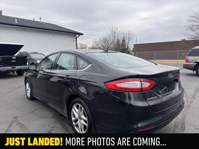 used 2014 Ford Fusion car, priced at $7,990