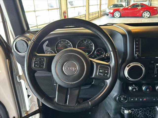 used 2015 Jeep Wrangler Unlimited car, priced at $20,990