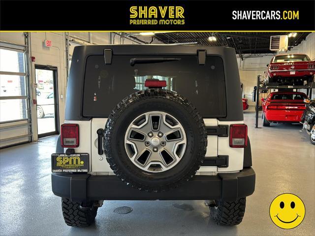 used 2015 Jeep Wrangler Unlimited car, priced at $20,990