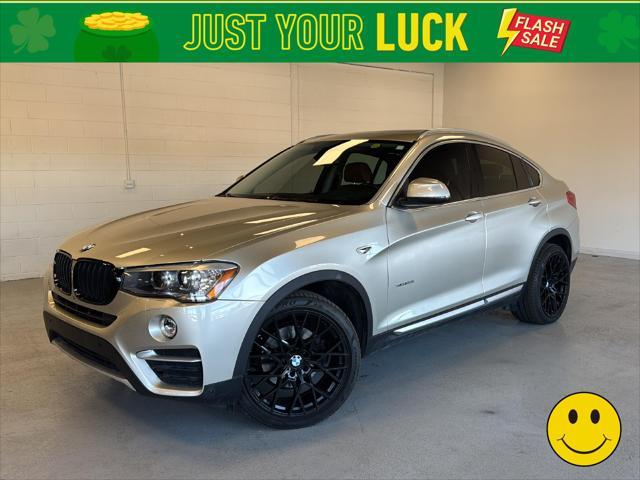 used 2015 BMW X4 car, priced at $17,590