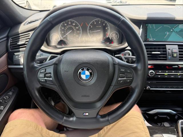used 2016 BMW X4 car, priced at $19,900