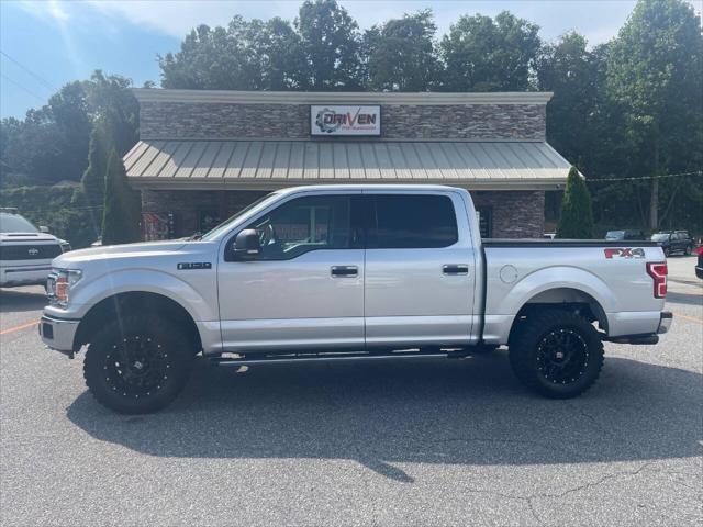 used 2018 Ford F-150 car, priced at $27,900