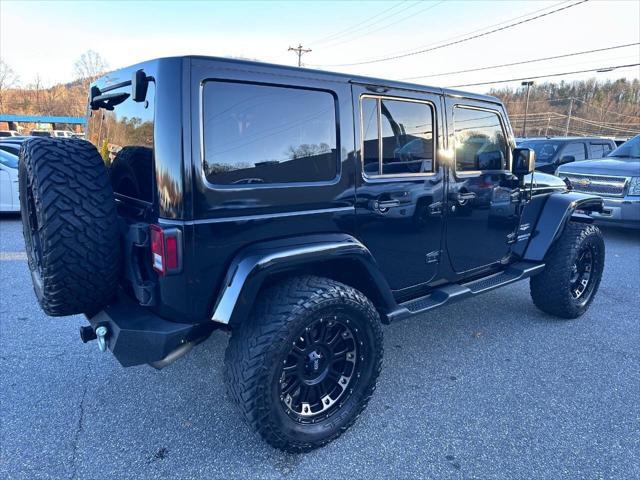 used 2015 Jeep Wrangler Unlimited car, priced at $22,900