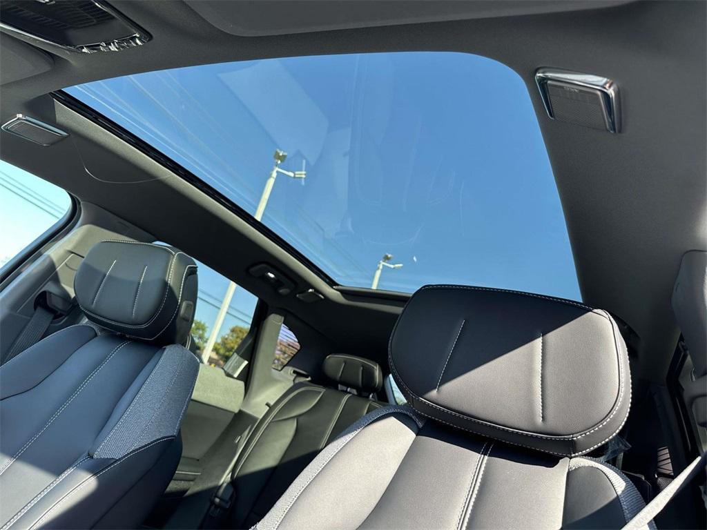 new 2025 Cadillac OPTIQ car, priced at $56,215