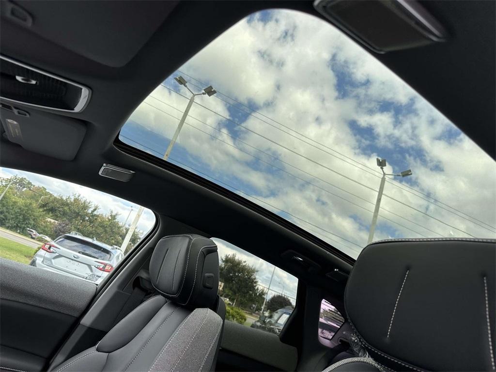 new 2025 Cadillac OPTIQ car, priced at $54,990