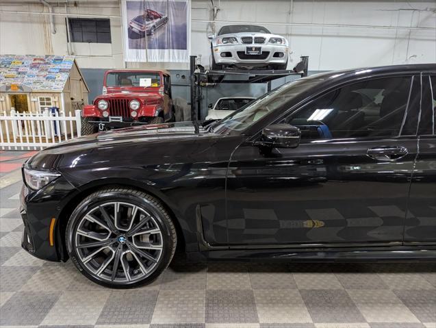 used 2022 BMW 750 car, priced at $55,000