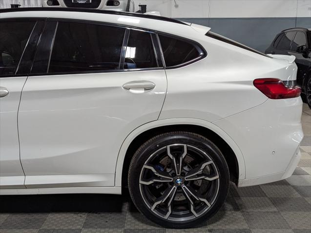 used 2021 BMW X4 M car, priced at $53,000