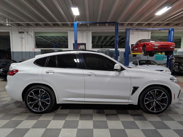 used 2021 BMW X4 M car, priced at $53,000