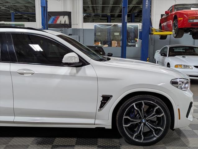 used 2021 BMW X4 M car, priced at $53,000