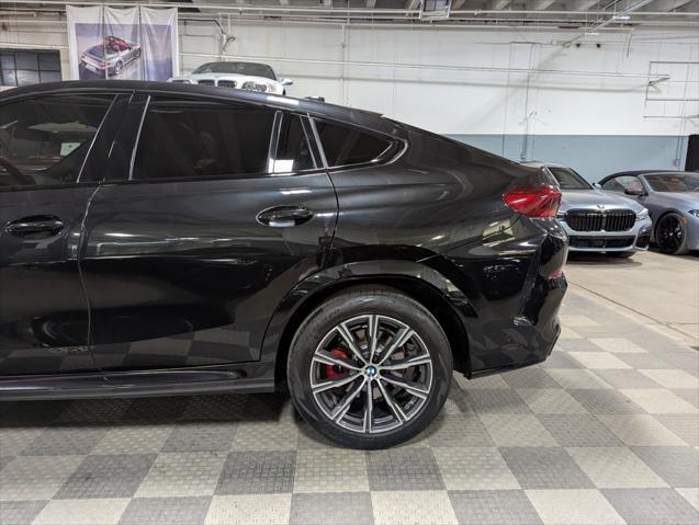 used 2022 BMW X6 car, priced at $58,000