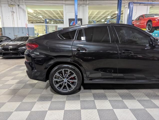 used 2022 BMW X6 car, priced at $58,000