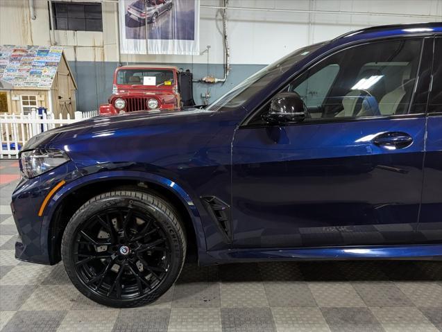 used 2022 BMW X5 M car, priced at $75,000
