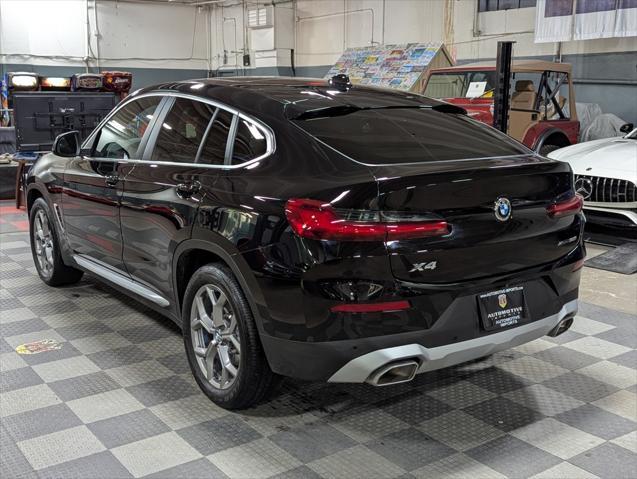 used 2023 BMW X4 car, priced at $43,082