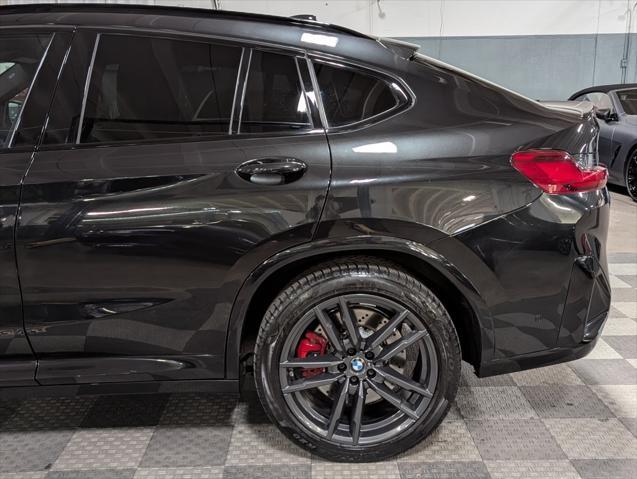 used 2022 BMW X4 M car, priced at $67,500