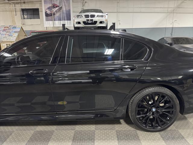 used 2022 BMW 750 car, priced at $60,000
