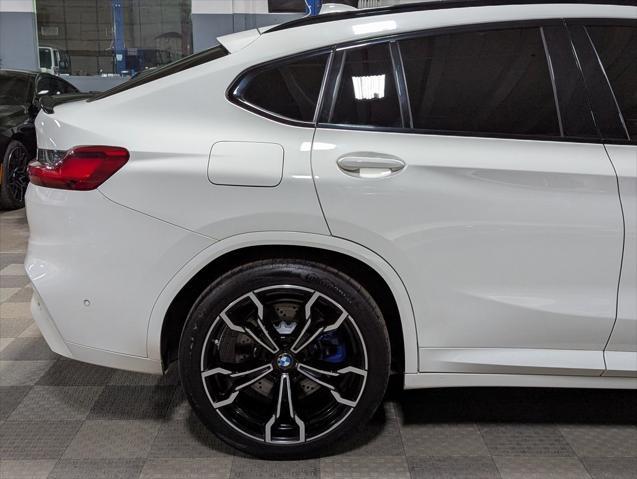 used 2021 BMW X4 M car, priced at $55,000