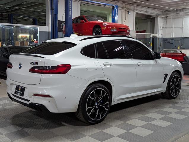 used 2021 BMW X4 M car, priced at $55,000