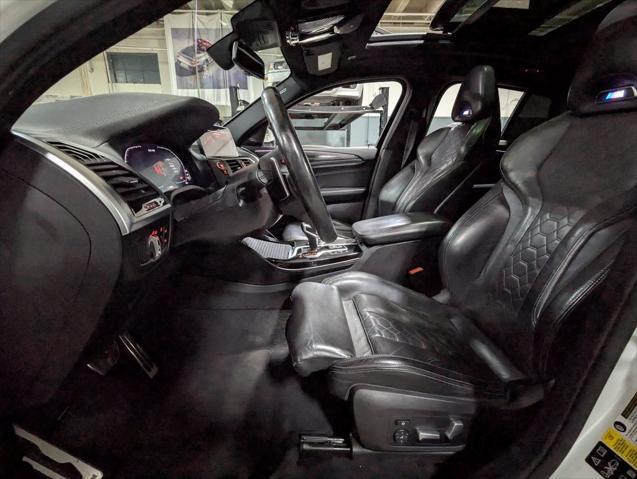 used 2021 BMW X4 M car, priced at $55,000
