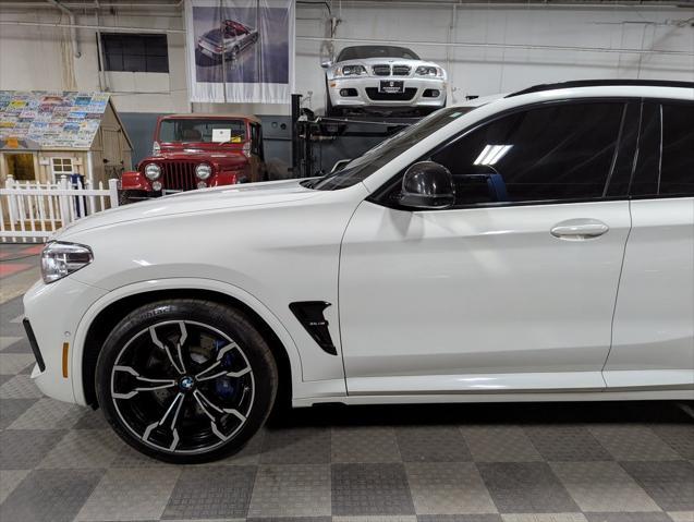 used 2021 BMW X4 M car, priced at $55,000