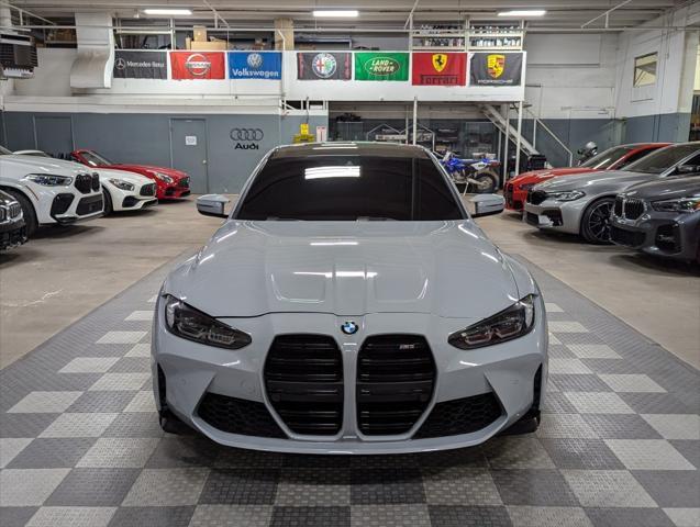 used 2022 BMW M3 car, priced at $65,000