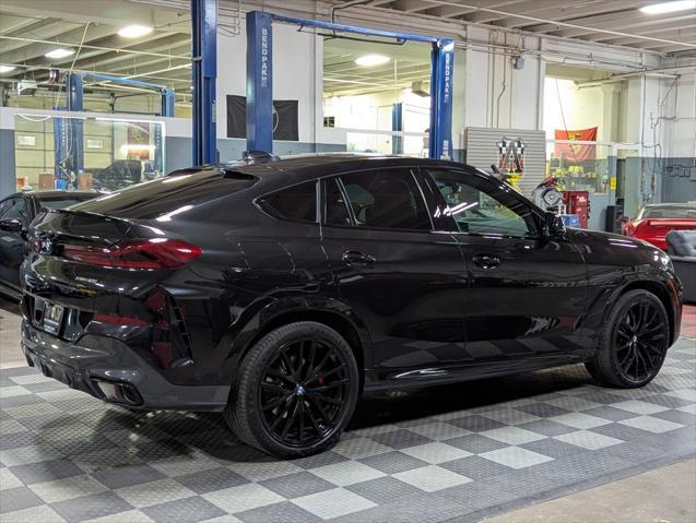 used 2023 BMW X6 car, priced at $59,500