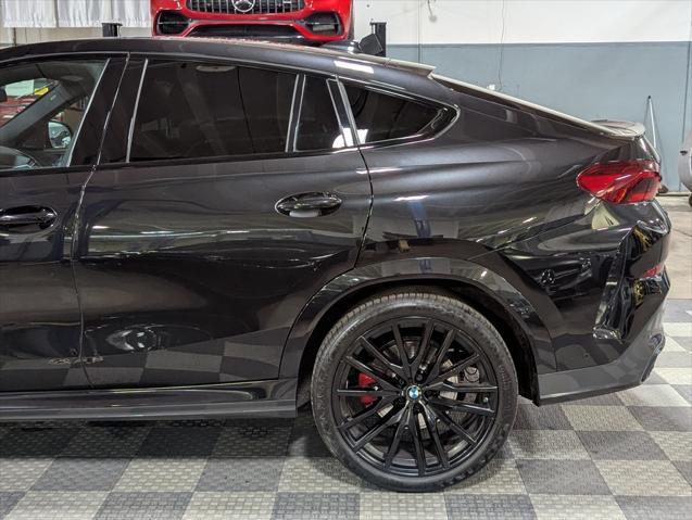 used 2023 BMW X6 car, priced at $59,500