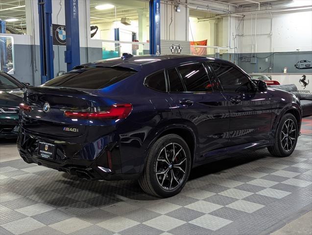 used 2022 BMW X4 car, priced at $50,090