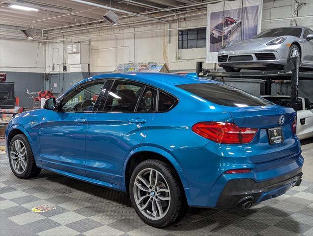 used 2018 BMW X4 car, priced at $32,000