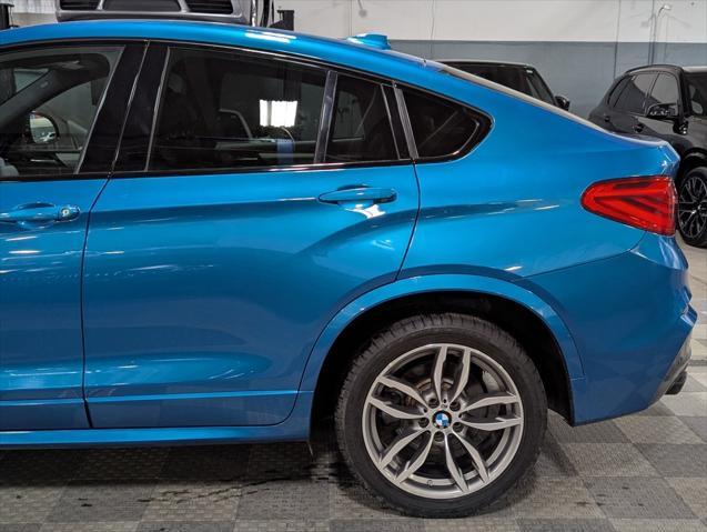 used 2018 BMW X4 car, priced at $32,000