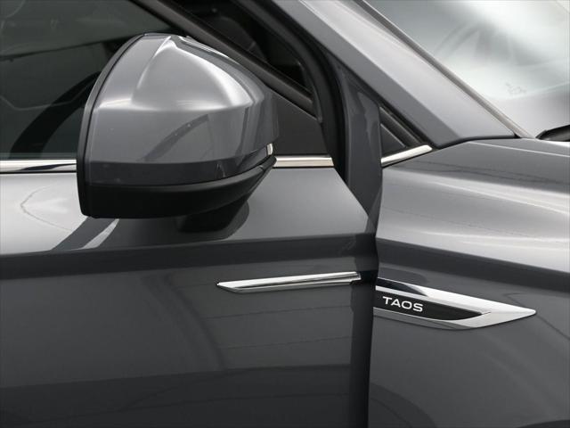 used 2023 Volkswagen Taos car, priced at $22,988