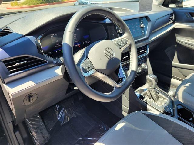 used 2024 Volkswagen Taos car, priced at $27,000