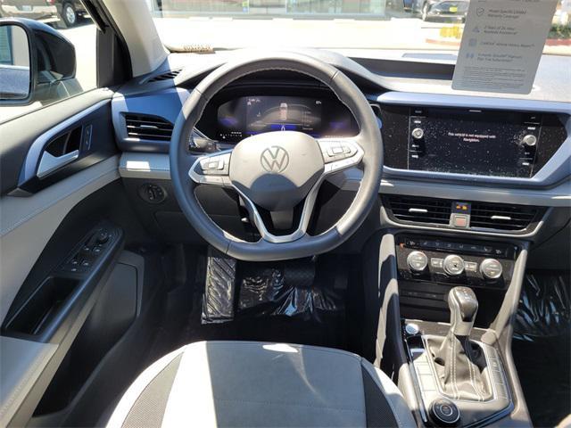 used 2024 Volkswagen Taos car, priced at $27,000