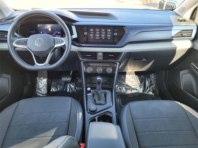 used 2023 Volkswagen Taos car, priced at $21,000